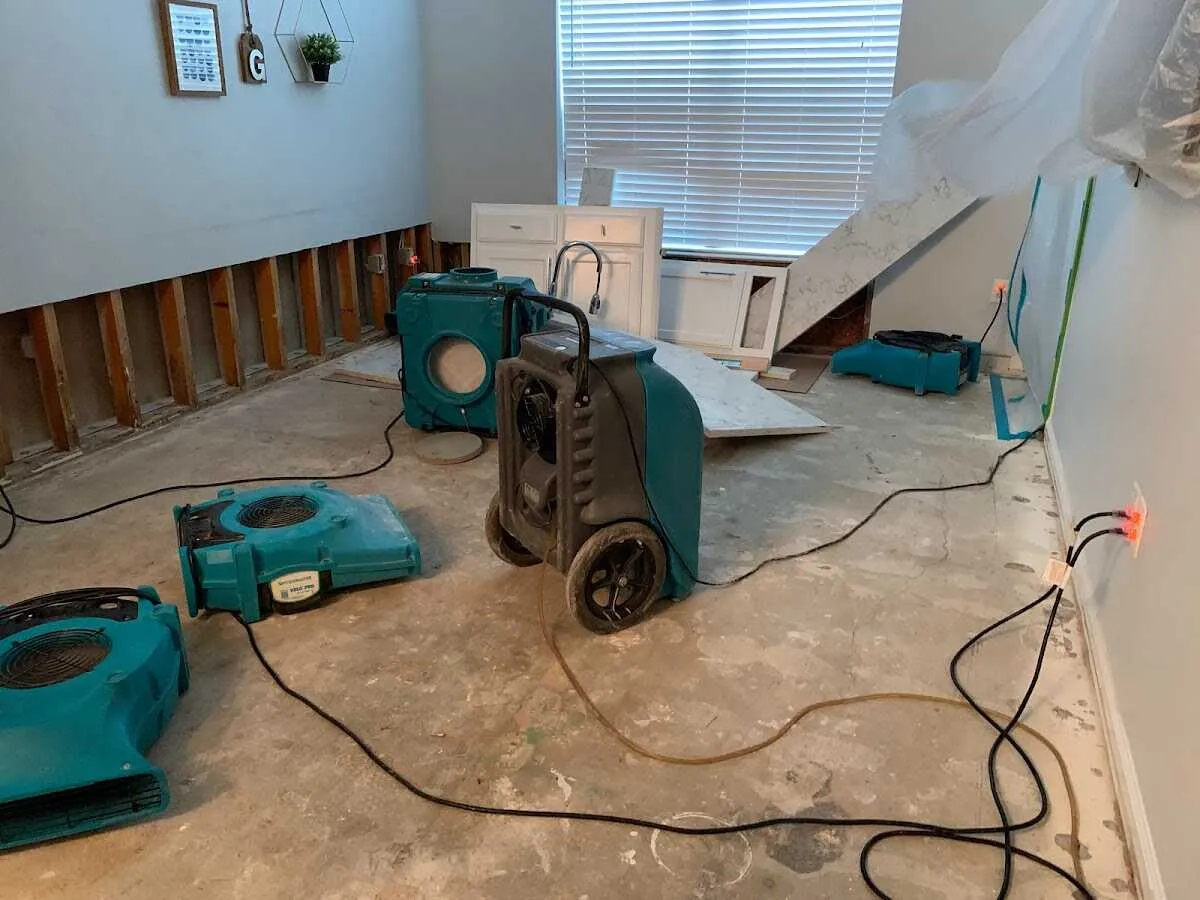 Dehumidifier in flood-cut room for Water Damage Restoration in Little Silver